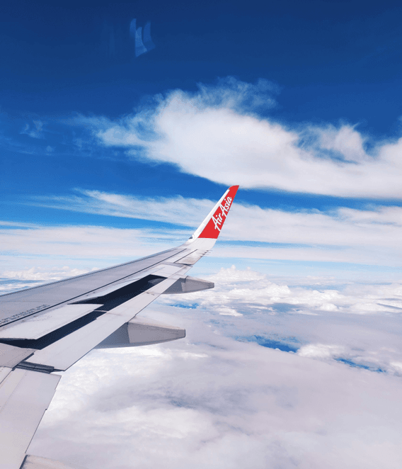 AirAsia Flight Above Cloudscape to Thailand