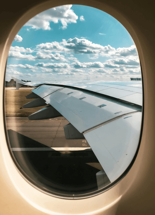 Aircraft Cabin Porthole Window View on Runway Approach