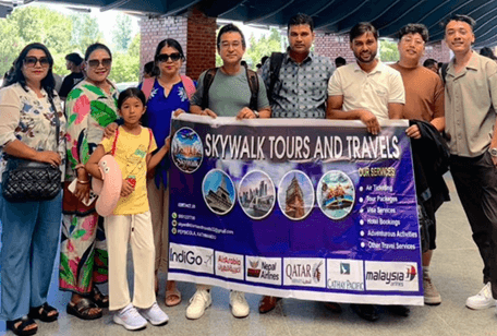 SkyWalk Travelers Tour Group with Official Banner
